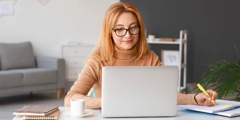 Learners browsing different AI badges on Credly