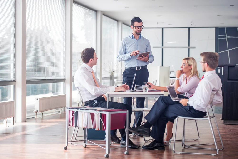 Business people sitting at corporate meeting (1)-1
